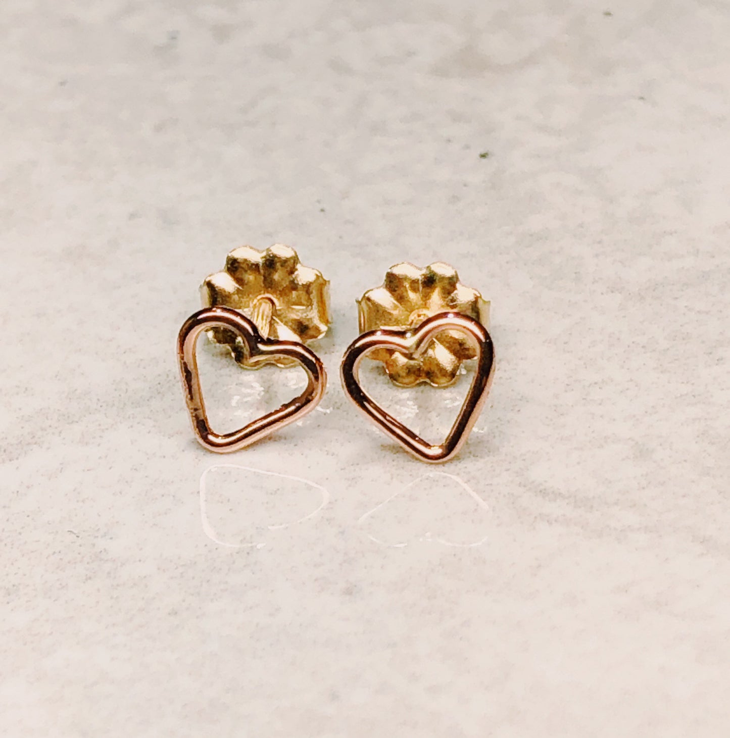 open heart earrings in 14k gold