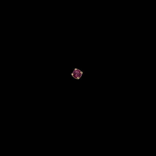 A 2mm Pink Garnet in a 4 prong 14kt gold stud