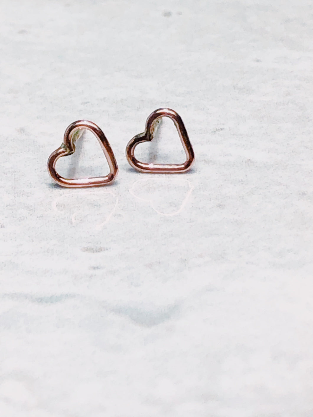 open heart earrings in 14k gold